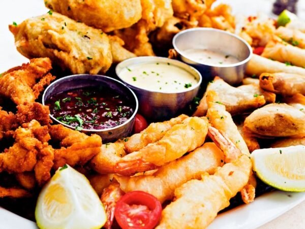 50 Chicken Wings & 25 pcs Fish & half tray Fries/Rice & with 2 liter soda